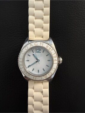 Coach Women's “Andee” White Silicone Strap Watch with Silver-Tone Bezel
